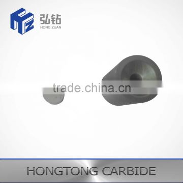 Tungsten carbide blast nozzles for the spraying and fine spraying of powders and liquids