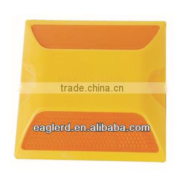 Yellow plastic road stud with double reflectors