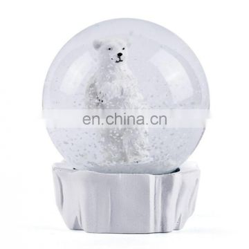 white resin bear snow globe