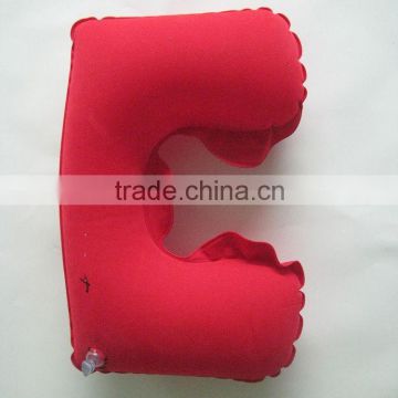 red air filled inflatable travel pillow