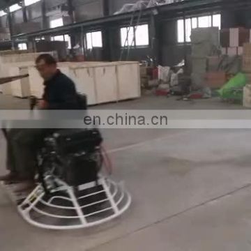 Ride on concrete power trowel for floor surface