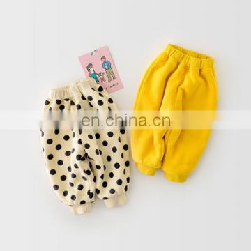 Winter new Korean version of ins men and women baby baby polka dot solid color leggings pants plus velvet thick bag fart pants