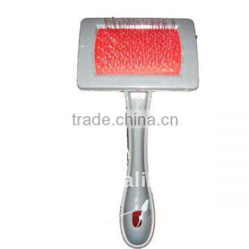 gray plastic dog brush