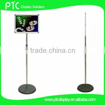 Poster stand with telescopic pole to adjust height