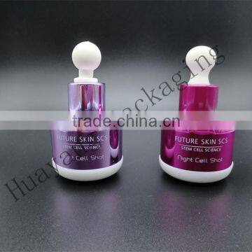 white ceremic glass bittle with outter cover and ball on the cap