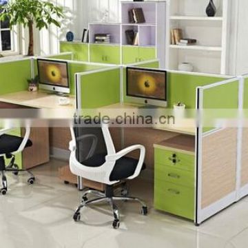 four people office workstation