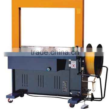 Fully automatic packing machine for packing belts