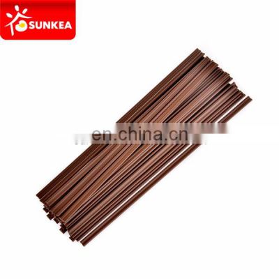 Individually wrapped brown color plastic coffee stirrer