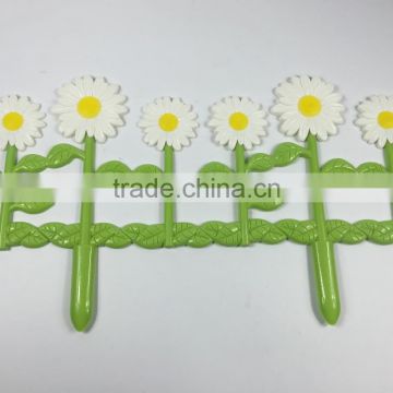 Decorative Plastic garden fence with daisies