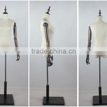 half mannequin female with wood arms