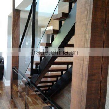 double tubular stringer stairs with glass guard and wood treads