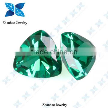 lab created green triangle shape colored spinel bead