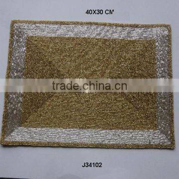 Golden Glass bead place mat with silver border available in more colours and patterns