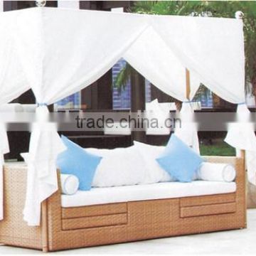 rattan beach sunbed in natural wicker with white comfortable cushion with cover