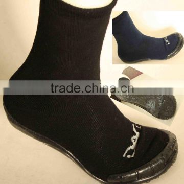 Man knitted socks with rubber soles