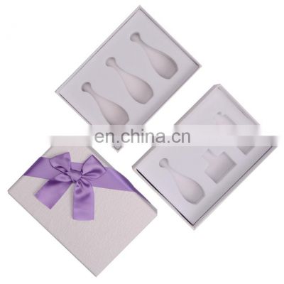 Wholesale custom fancy paper packaging with decorative bowknot for cosmetic essential oil bottle