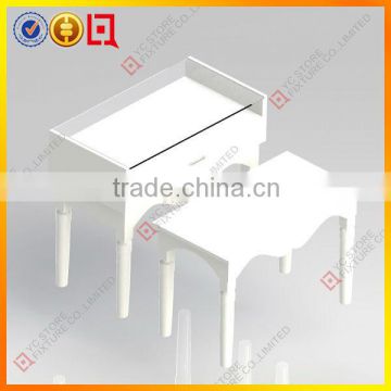 White color clothing/shoe retail display table