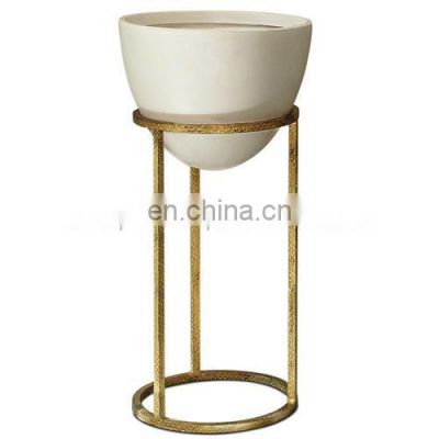white planter gold metal stand