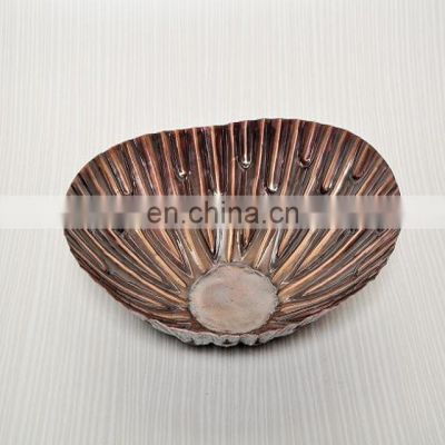 brown coloured oval shape bowls