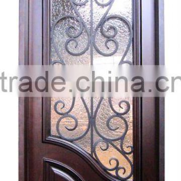 Wrought iron and wood entry dor