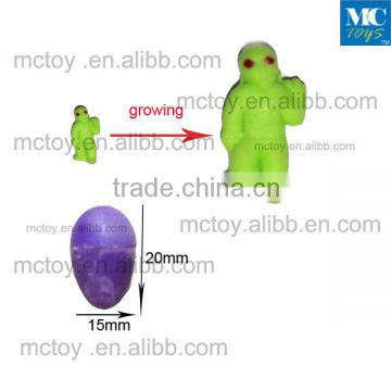 Mini size growing alien water toys small size growing dinosaur toy pet toy
