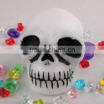 Death's head shaped LED candle