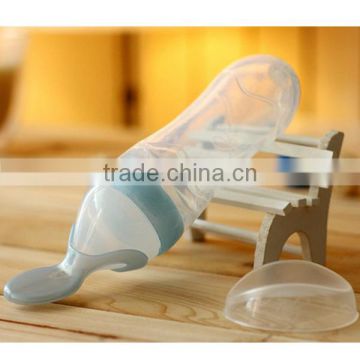 100%BPA free silicone squeezing feeder spoon baby silicone squeeze feeder