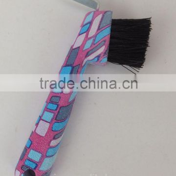 blue square patterned horse hoof pick with brush