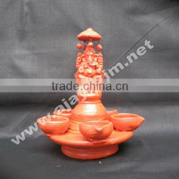 Ganesha in Oil Lamp