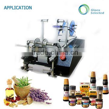 Semi automatic round container holographic labeling machine