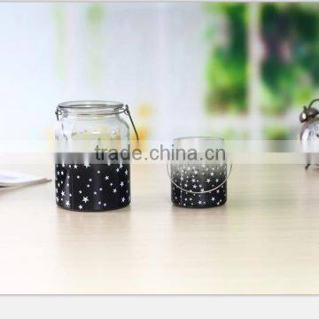 Glass candle jar wholesale with metal handle and stars