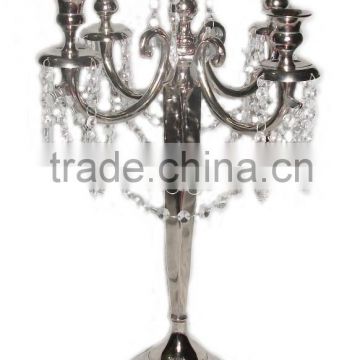 Faceted candelabra decorated with crystal