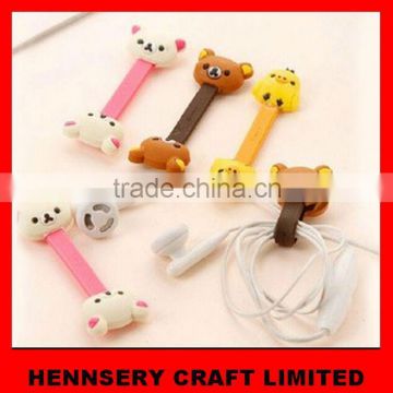 customized shape and logo soft pvc rubber earphone wire winder