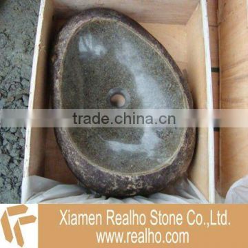 oval river stone sink