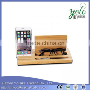Bamboo multi feature phone charger holder for mobile phone