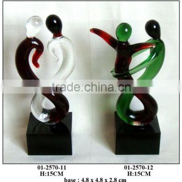 brown and green glass figures decoration