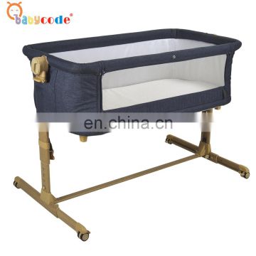2021 new aluminum extended wooden look finished adjustable rocking baby crib