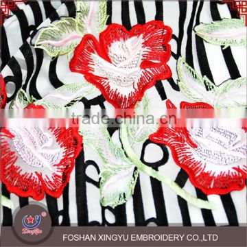 Hot-selling promotional custom crystal yarn red flower black stripe swiss lace for evening party dress use lace fabric