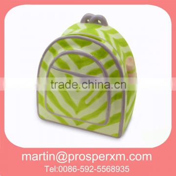 Wholesale Ceramic coin bank schoolbag shape