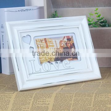 China wood carved photo picture frame factory