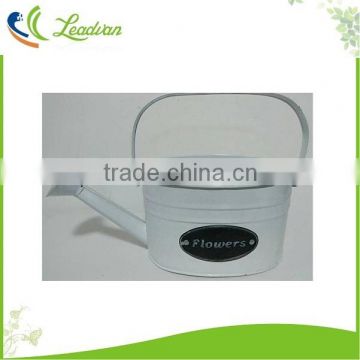 White flower decorative small metal water can