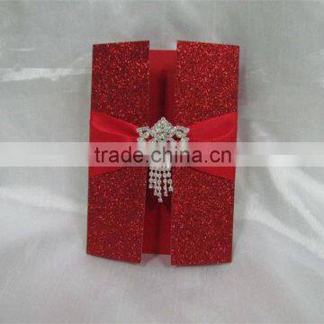 Glitter red folio wedding invitation cards with red ribbons and rhinestone brooches