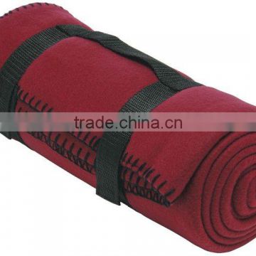 2013 travel solid color blanket with a strap
