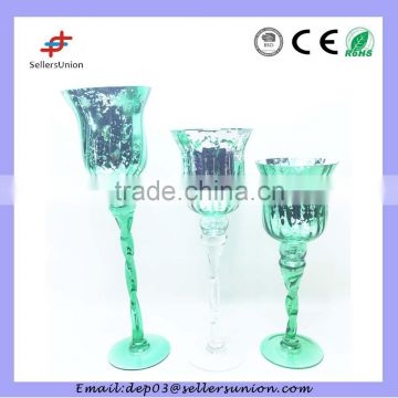 long-stemmed decorative glass candle holder