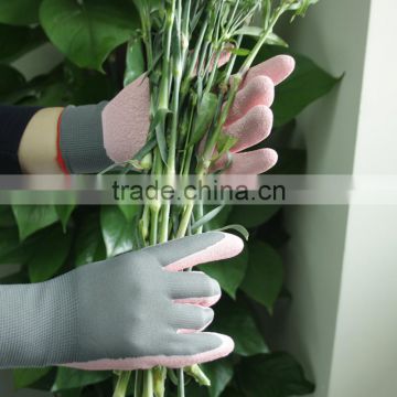 NMSAFETY EN388 13 gauge grey nylon coated pink latex glove /Industrial gloves from China