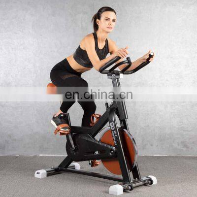 Strong and handsome healthy spin bike exercise for gym use