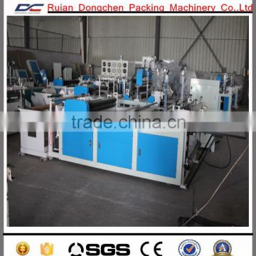 Textile fabric embossing and cutting machine
