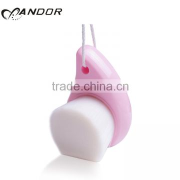 Patent design pink handle andor face cleansing brush