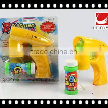 flashing musical solid color bubble gun with 1 bottle bubble water
