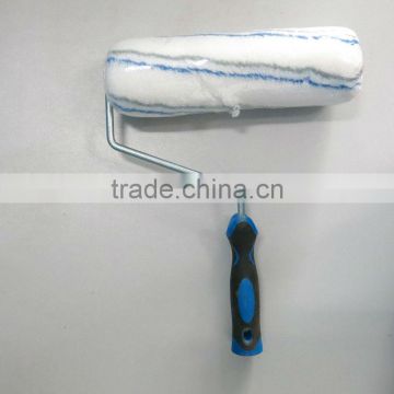 White and blue stripes decorative paint roller in brush